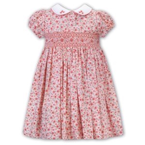 Sarah Louise Girls White And Peach Short Sleeve Dress With Floral Pattern And Smocking